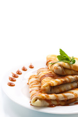 pancakes with syrup and mint