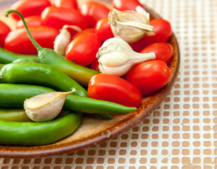 chilli peppers, cherry tomatoes and garlic