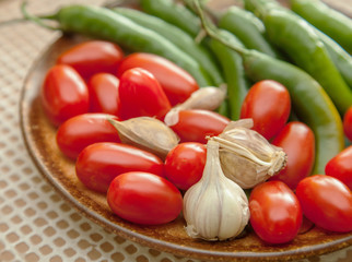 chilli peppers, cherry tomatoes and garlic