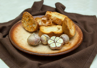 slice of grilled baguette and garlic