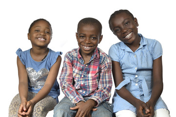 Drei afrikanische Kinder laecheln