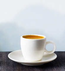Cup of coffee on highlands background