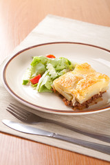 Front ground beef meat with tomato and cream