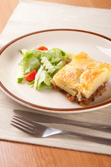 Front ground beef meat with tomato and cream