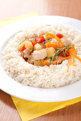 Pork with vegetables, garlic and rice