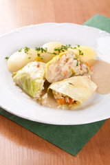 Cabbage rolls stuffed with rice and sauce