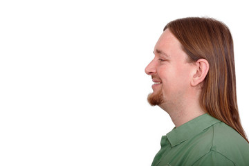 Friendly man with long hair in side profile © Edler von Rabenstein