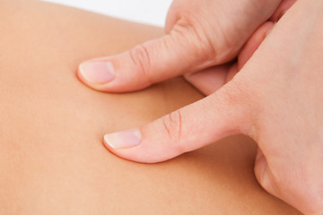 Person Receiving Shiatsu Treatment