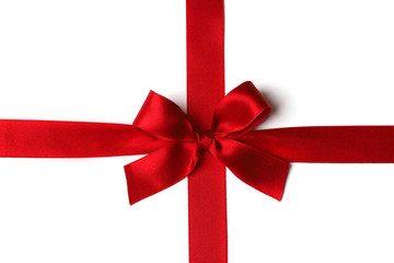 Red ribbon with bow on white