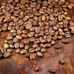 coffee beans on wooden background