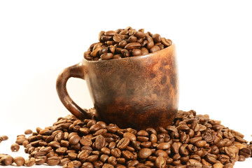 coffee beans and cup on white background