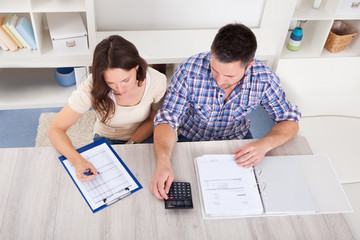 Couple Calculating Bills
