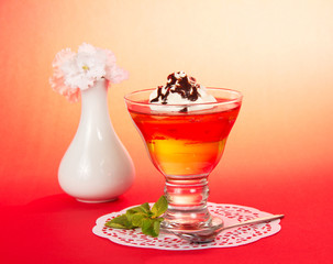 Glass of dessert is decorated with chocolate