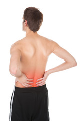 Young Man Holding His Back