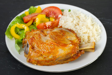 pork with rice and salad