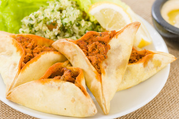 Fatayer - Arab pastry filled with spicy meat.
