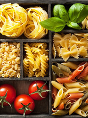 various pasta in black wooden box