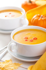 pumpkin soup in white bowl