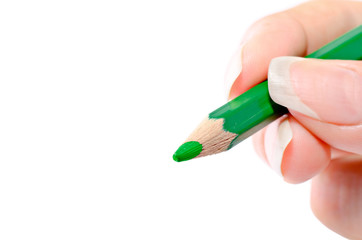 Image of a hand holding a green pencil