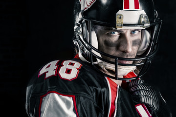 Cropped image of american football player