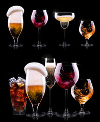 set with different drinks on black background