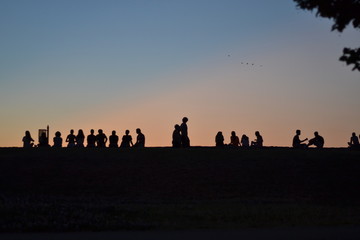Fototapeta na wymiar sunset and people