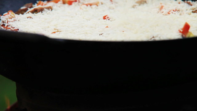 Pilaf (Plov) preparation Afghan, Uzbek, Tajik national cuisine