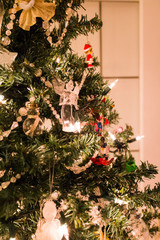 Fototapeta na wymiar christmas tree by door