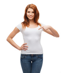 Fototapeta premium smiling teenager in blank white t-shirt