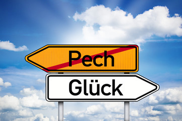 Wegweiser mit Pech und Glück