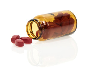 Tablets scattered from bottle