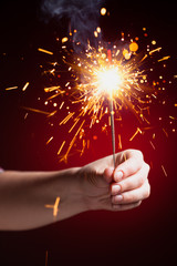 sparkler in hand