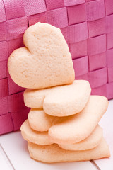 homemade heart cookies on wooden background