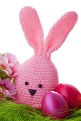 handmade easter bunny with colorful flowers and easter eggs