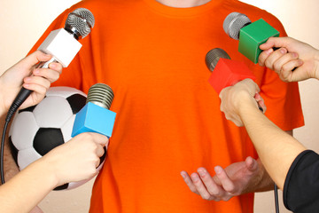 Conference meeting microphones and footballer