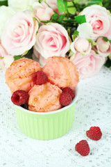 Delicious ice cream in bowl on table close-up