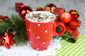 Hot chocolate with cream in color mug,