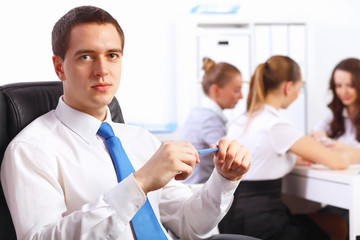 Fototapeta premium Young businessmen working in the office