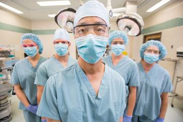 Medical Team Standing In Operation Room