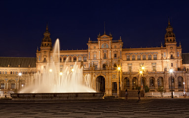 Fototapeta na wymiar fountain on Plaza de Espana at night, Seville, Spain