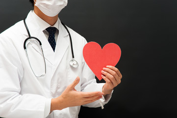 ハートマークを持つ医者