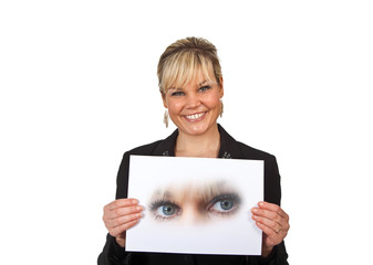 Fototapeta premium Studio portrait of a cute blond girl holding a piece of paper