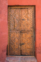 wooden door in Santa Catalina monastery Arequipa Peru