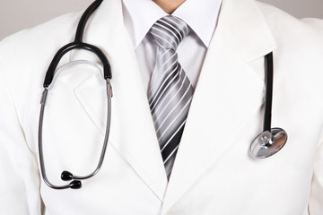 Close up of a doctors white coat and stethoscope