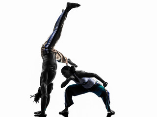 couple capoeira dancers dancing   silhouette