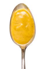 Löffel mit würziger Currysauce