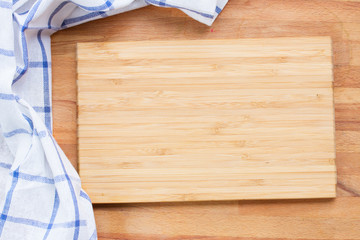 cutting board and  blue  napkin