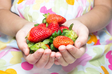 Handful of Red sweet strawberries