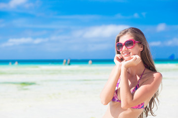 long haired girl in bikini on tropical holbox beach