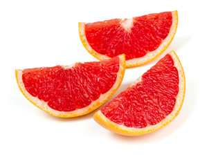 cut red grapefruit isolated on white